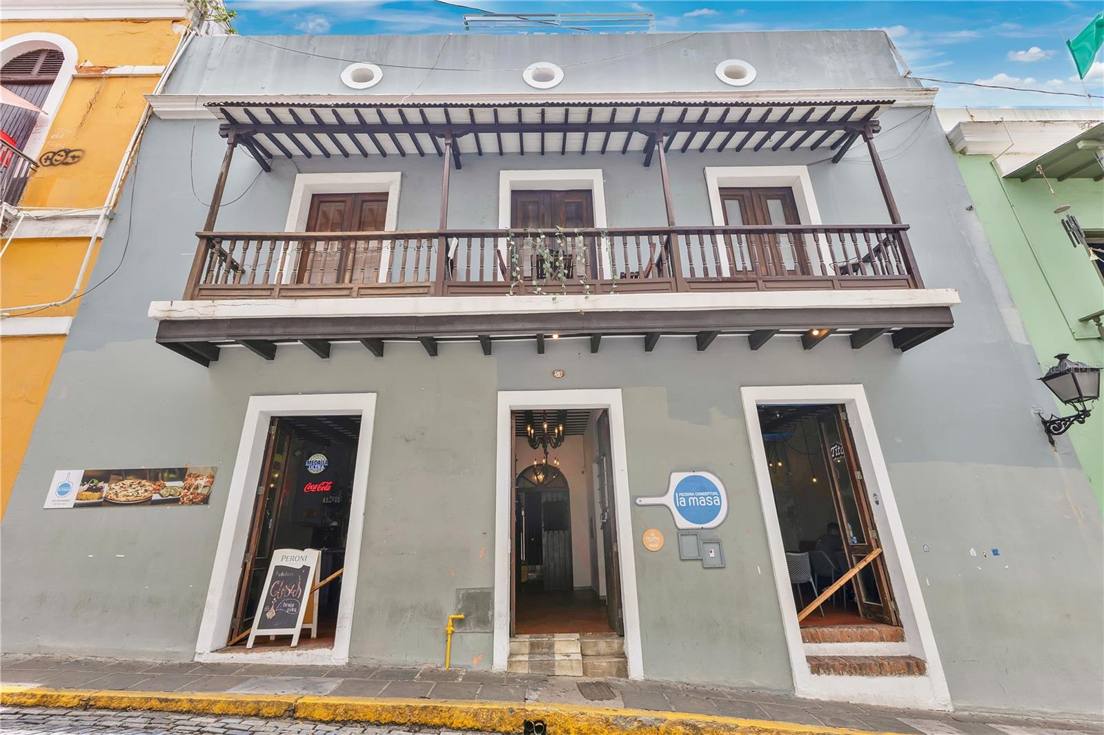 Step into the charm of historic Old San Juan with this stunning apartment in Condominio El Arzobispado, ideally located at #51 Calle Del Cristo, Apt #5. Nestled within the vibrant streets of Viejo San Juan, this beautifully maintained residence blends colonial architecture with modern comforts. From its high ceilings and classic details to its updated finishes, every corner of this apartment tells a story of timeless elegance and thoughtful design.
Whether you’re looking for a full-time home, a vacation retreat, or an investment property in one of Puerto Rico’s most iconic neighborhoods, this apartment delivers. Just steps away from San Juan’s best restaurants, galleries, and historic landmarks, you'll enjoy the lively energy of the city while relaxing in the peaceful atmosphere of this exclusive building. Experience the unique magic of Old San Juan living schedule a private showing today and make this exceptional property your own.
Property Features:
- Sale price: $475,000
- Gross living area: 877.13 SQFT
- Bedrooms: 1
- Bathrooms: 1
- Rooftop with panoramic city view
- Fully Furnished
- Kitchen fully equipped
- Emergency water cistern
- Airbnb Friendly