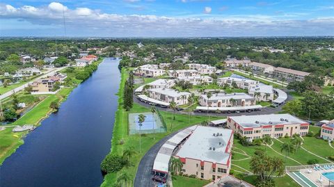 Photo of 116 Elmwood Circle, Seminole, FL 33777 (MLS # TB8431584)