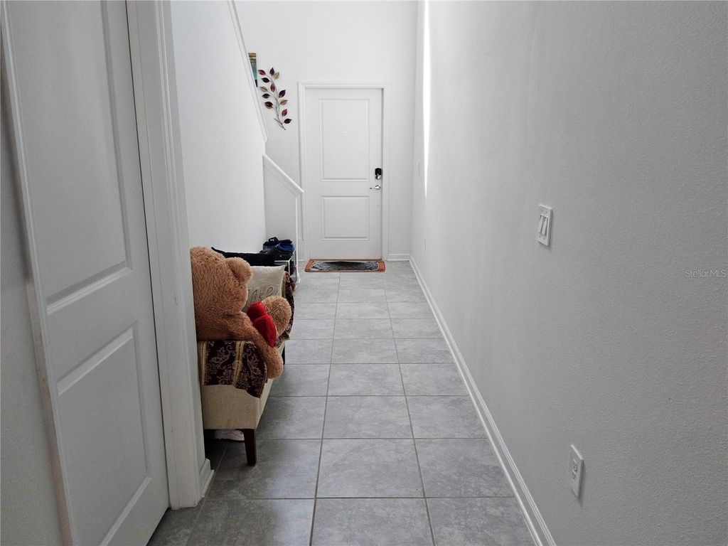 Photo of 533 Sea Turtle Lane, Haines City, FL 33844 (MLS # O6395352)