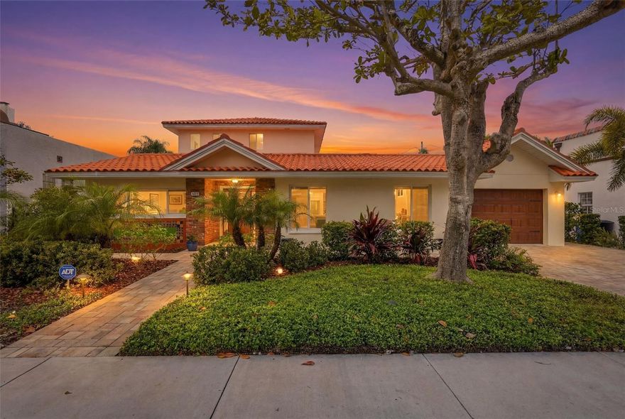 Live the Luxury. Love the Location......This stunning residence, completely rebuilt in 2015, is a masterpiece of craftsmanship and architectural grace. Located in a NON-flood zone, Evacuation Zone D, beyond flood concerns, just steps from Coffee Pot Bayou and downtown St. Petersburg’s vibrant charm. This 4 bedroom and 3 bathroom, home includes a serene main-level primary suite with custom walk-in closet and a spa-inspired ensuite featuring dual vanities, a walk-in shower, and a private water closet. An additional main-level bedroom doubles as a guest suite, office, or cozy den, Upstairs, two charming bedrooms, a full bathroom with double sinks and a tub, a cozy sitting area, and a whimsical hidden doorway add a touch of intrigue and delight.

At its heart lies a chef’s kitchen of unparalleled sophistication, with ALL premium VIKING appliances, including double ovens, extra large fridge, a 6-burner electric range with a warming drawer, a wine cooler, and more—all seamlessly combining high performance with sleek design.  Natural light floods the home through strategically placed oversized, hurricane-grade windows, illuminating soaring ceilings and grand doorways. The residence is equipped with two A/C units, an oversized water heater, and an expansive indoor laundry room for ultimate comfort and convenience.

Outside, a private resort-style oasis awaits. The heated saltwater pool, installed in 2022, shimmers under the sun, while an Italian-designed rotating canopy offers effortless control of light and shade. The outdoor kitchen, complete with a VIKING gas grill, sink, and shower, ensures seamless alfresco entertaining. A rare climate-controlled storage room and a double-insulated attic provide exceptional storage solutions while also enhancing energy efficiency. The air-conditioned oversized, garage, was built in 2021,  designed to appeal to the most discerning automotive enthusiast or to serve as an exceptional entertaining space. Natural light floods the garage through oversized windows and a mahogany side door, creating a bright and inviting atmosphere. This home represents a rare fusion of luxury, functionality, and lifestyle in one of the region’s most coveted locations. Enjoy exploring scenic parks, renowned golf courses, marinas, and the iconic St. Pete Pier, all accessible by foot, bike, or even golf cart. A short drive delivers you to Florida’s world-class beaches, and Tampa International Airport, just 25 minutes away, ensures effortless connectivity. Every detail has been meticulously curated to offer an unparalleled living experience.