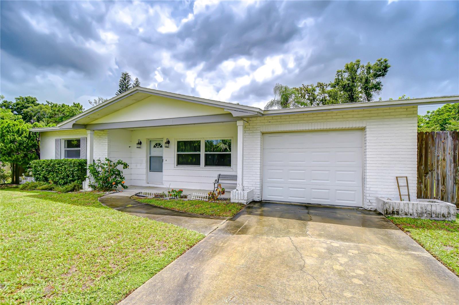 Bright and spacious ranch style home in beautiful Clearwater! Step into comfort and charm with this lovely 2-bedroom, 2-bathroom home in the peaceful neighborhood – Clearview Heights. With 1,344 square feet of living space, there’s plenty of room to relax, entertain, and make lasting memories. You’ll love the open layout that connects the large living room and dining area—ideal for hosting friends or enjoying cozy nights in. Just off the main living space is a light-filled Florida room surrounded by windows, perfect for enjoying your morning coffee or soaking in the backyard view. The fenced backyard is spacious and private, offering tons of potential—add a pool, build a garden, or create your own outdoor paradise! The kitchen features a sunny breakfast nook and overlooks an enclosed screened patio, giving you a quiet space to unwind. The primary bedroom has a generous walk-in closet and a bathroom with a tub and shower combo. The second bedroom comes with its own ensuite bathroom and walk-in shower—great for guests, family, or multigenerational living. This home combines space, warmth, and functionality in a central Clearwater location. Minutes to the sandy white beaches of Florida’s gulf coast. Easy access to Tampa International Airport, St. Pete/Clearwater Airport, downtowns Tampa and St. Petersburg, dining, shopping and healthcare nearby. Don’t miss your chance to make it your own!