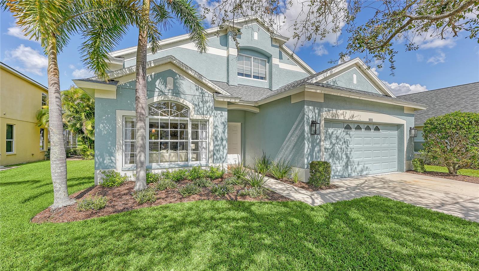 **NEW LISTING - AMAZING LOCATION, COMPLETELY RENOVATED**This stunning LAKEFRONT home is nestled in the GATED community of SILVERLAKE and showcases an exceptional and comprehensive renovation. With FOUR spacious bedrooms, TWO full bathrooms, and a HALF BATH, there’s plenty of room to host your family and entertain your friends. The LIST OF UPDATES to this house is extensive but the highlights include a NEW ROOF (2022), fresh EXTERIOR PAINT (2021), updated KITCHEN, renovated MASTER BATH, an updated HOT WATER HEATER (2022) and (2017) A/C unit. Step inside to find LUXURY WIDE PLANK VINYL flooring which creates a modern, beachy vibe throughout the OPEN-CONCEPT main floor. You'll also find an over-sized FIRST-FLOOR master bedroom suite with high ceilings and a gorgeous and spacious master ensuite. The chef's kitchen has contemporary QUARTZ countertops, DESIGNER lighting fixtures, and NEW APPLIANCES and a custom BUILT-IN WINE BAR highlights the living and dining areas. Before heading upstairs, be sure to check out the stylish HALF BATH with designer finishes, conveniently located near the laundry area. UPSTAIRS, you’ll discover THREE additional bedrooms, a FINISHED LOFT area, and a LARGE full bath. Outside, enjoy the SCREENED LANAI with breathtaking water views that overlook your private, spacious lot. Best of all, enjoy the benefits of LOW HOA fees and NO CDD in this wonderful community!