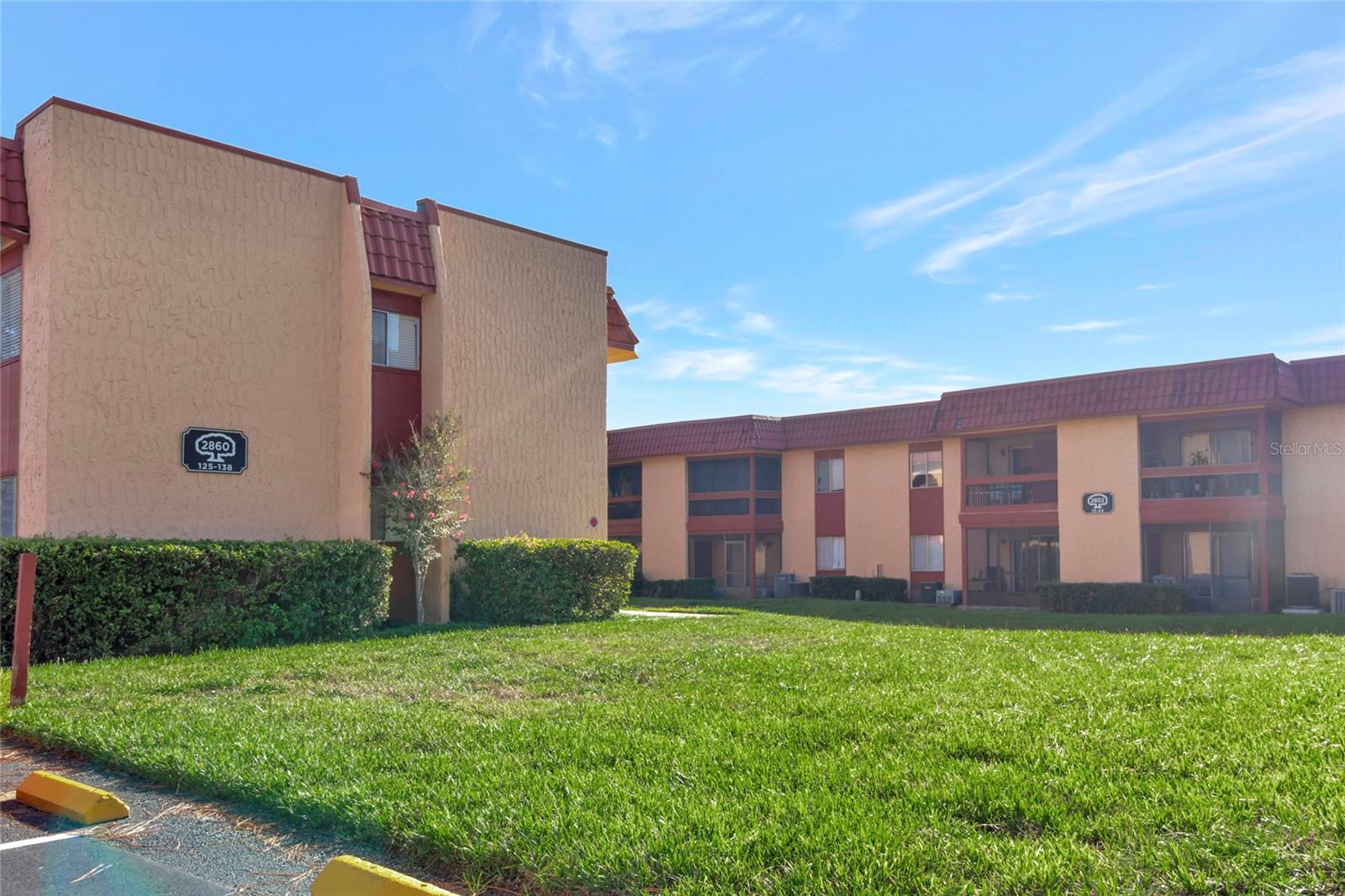 This is the only two-bedroom, two-bath unit available in the community! The home features an open, bright living space with beautiful tile flooring throughout, complemented by stainless steel appliances. It also includes a convenient indoor laundry hook-up. Additionally, there is a nearby on-site laundry facility for added ease. Enjoy the spacious screened-in porch and a large storage closet. Located in the gated community of Oak Shadows, residents have access to fantastic amenities such as a sparkling pool, barbecue and recreation area, shuffleboard, tennis courts, and more. Conveniently situated close to bus lines, supermarkets, restaurants, pharmacies, major highways, shopping centers, and schools. Just minutes from major Orlando attractions including Disney, SeaWorld, Universal Studios, Islands of Adventure, and Volcano Bay. The Orlando International Airport is only 30 minutes away. Call today!
