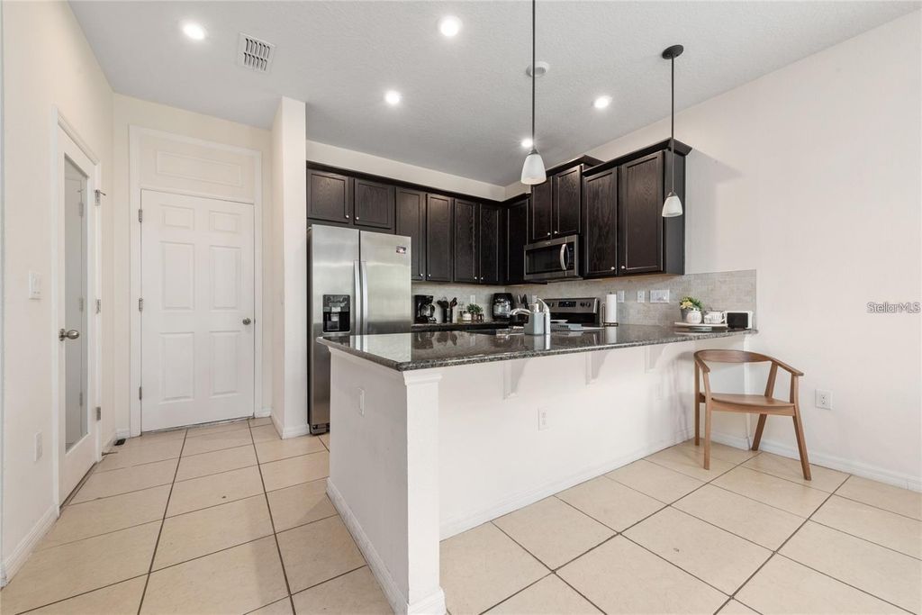 Photo of 2449 Varenna Loop, Kissimmee, FL 34741 (MLS # S5148673)