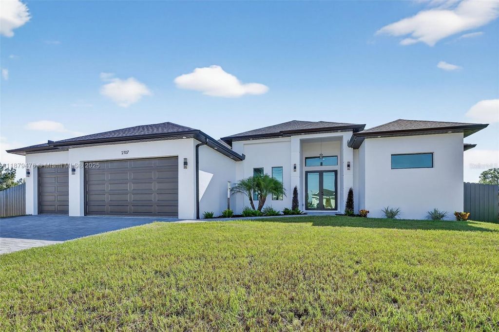 Photo of 2107 NW 2nd Place, Cape Coral, FL 33993 (MLS # O6345701)