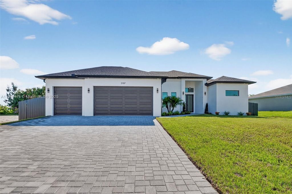 Photo of 2107 NW 2nd Place, Cape Coral, FL 33993 (MLS # O6345701)