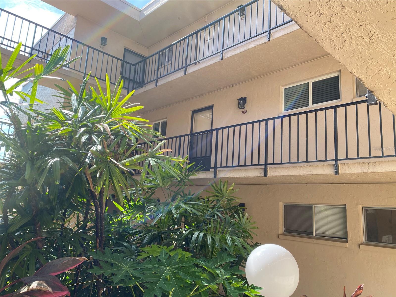 Attention!!!! This CONDO has a NEW 12 MONTH LEASE at a GREAT Monthly RENTAL !!!! COMPLETELY FURNISHED!!!!Condominium!! Seasonal Snow Birds!!Full-Time Residents!! Investors!!! Great Condo to live-in or rent!!!Completely updated Condo Unit 5 miles from Siesta Key Beach fully furnished. All windows and sliding glass doors updated with UV hurricane Impact Glass!!! Pinewood Village has a Large Heated Pool, Clubhouse, Fitness Center and Shuffleboard Courts. Furniture includes 2 large HD TV's, kitchen was remodeled with Granite Countertops, Stainless Appliances, Wood Cabinets. Both bathrooms have been total re-done. The master suite bedroom has Plantation shutters for privacy, upgraded fixtures in the bathroom and a walk -in closet. Condo was replumbed, new A/C in 2018, and new kitchen in 2019. Centrally located minutes from beaches, shopping and in the Sarasota School District. The low monthly maintenance fees include Cable TV, Community Pool, Insurance, Maintenance Exterior, Maintenance Grounds, Pool Maintenance, Sewer and Water, and Pest Control. Private Storage Unit and Laundry facilities on Condo Floor, elevator and assigned parking. Tenant in place ready to sign an annual Lease with new owner, if desired!!