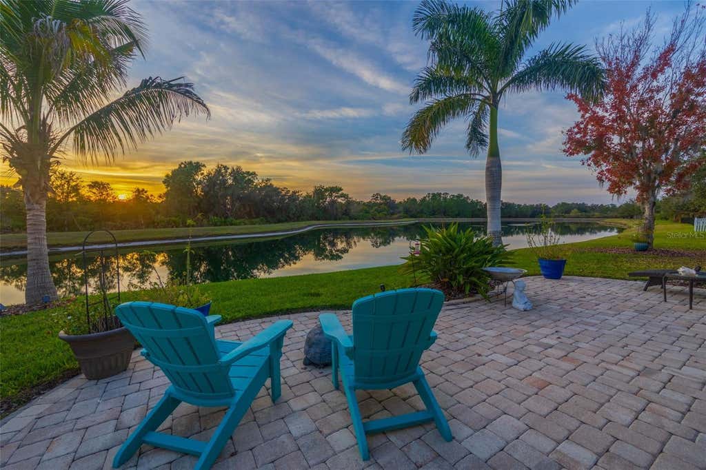 Photo of 5652 Fisher Glen Loop, Wesley Chapel, FL 33545 (MLS # TB8523230)