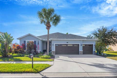 Photo of 5652 Fisher Glen Loop, Wesley Chapel, FL 33545 (MLS # TB8523230)