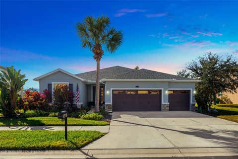 Photo of 5652 Fisher Glen Loop, Wesley Chapel, FL 33545 (MLS # TB8523230)