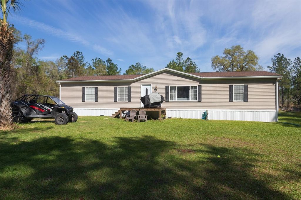 Photo of 6965 NE 137th Place, Citra, FL 32113 (MLS # OM721384)