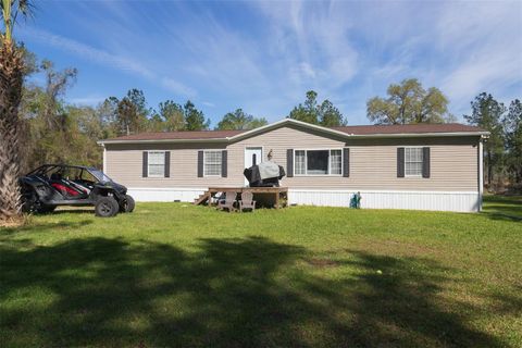 Photo of 6965 NE 137th Place, Citra, FL 32113 (MLS # OM721384)