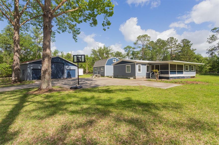 Set on 8 beautiful acres, this unique property offers a rare combination of space, versatility, and income potential. The estate features two separate residences, making it ideal for multi-family living, rental income, or a private owner’s retreat with guest accommodations.
The property includes a screened-in pool, perfect for relaxing or entertaining year-round while enjoying the peaceful surroundings. A detached garage and additional outbuilding provide plenty of space for storage, hobbies, equipment, or a workshop. A serene water feature adds to the natural beauty of the land, creating a tranquil setting that enhances the property’s charm.
With its flexible layout and multiple structures, this property presents an excellent opportunity for investment or lifestyle living. It could function well as a long-term rental property, vacation rental, multi-generational homestead, or a retirement retreat with built-in income potential. Conveniently located near North Marion High School with a short commute to the University of Florida, the property offers both privacy and accessibility to schools, employment, and everyday amenities. Whether you’re looking to expand your investment portfolio or create a private country getaway with income possibilities, this versatile acreage is full of potential.