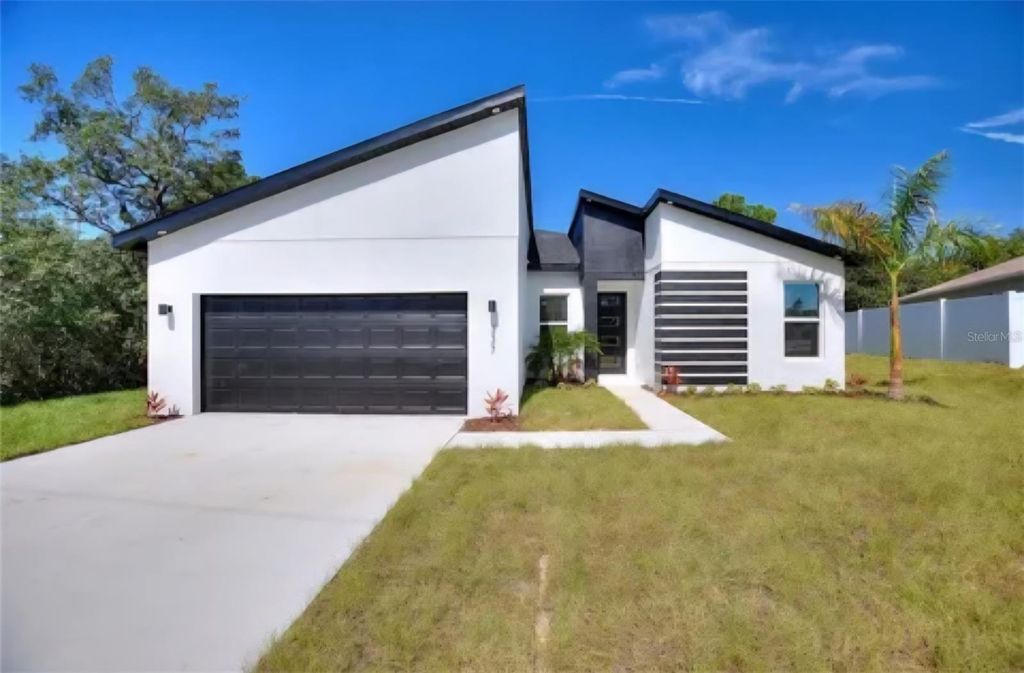 Photo of 112 Violet Court, Poinciana, FL 34759 (MLS # A4669109)