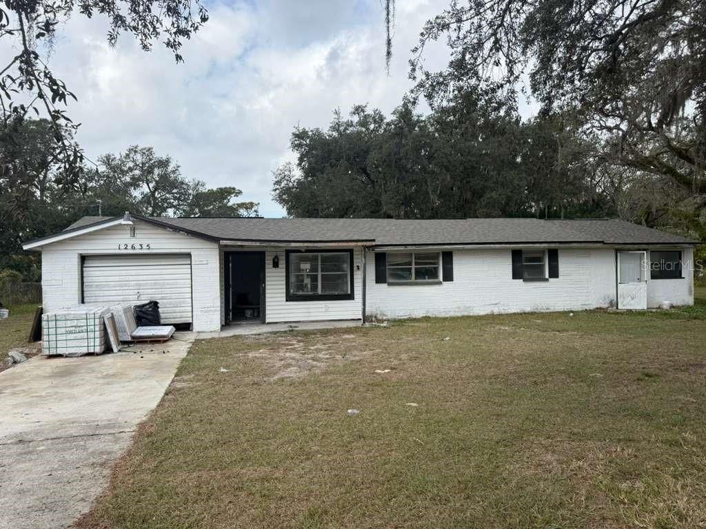 Photo of 12635 Colony Road, Hudson, FL 34669 (MLS # TB8465723)