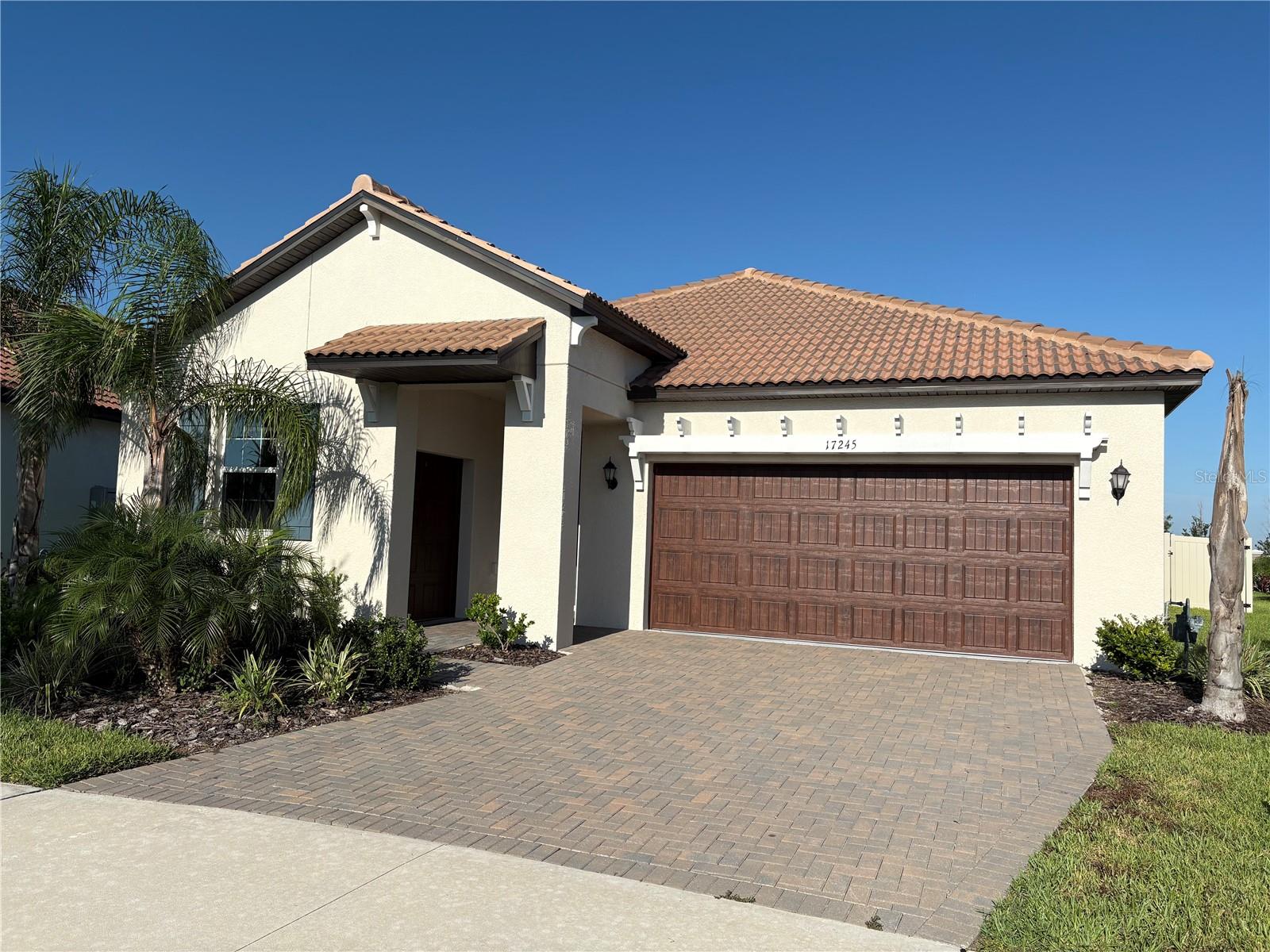 One of Tampa Bay’s best Active Adult Lifestyle Communities” This spacious single-story home features both a storage space and multipurpose flex space for comfortable living. The stylish kitchen, family room and dining room cohesively flow into a serene patio for indoor-outdoor entertaining. The expansive owner’s suite with a spa-like private bathroom overlooks two additional bedrooms ideal for overnight guests. The home is full of upgrades including a tile roof, quartz counter tops, crown molding, screened in lanai, golf cart garage and no back yard neighbors. Located in a LAGOON community with a 5-acre swimming pool with kayaking, paddleboarding swimming and a bar. Also, a clubhouse in the Medley side of the community with a pool, a restaurant and bar, gym, pickle ball courts and so many clubs and things to keep you busy in this 55+ community. One of the few 3-bedroom homes available.
