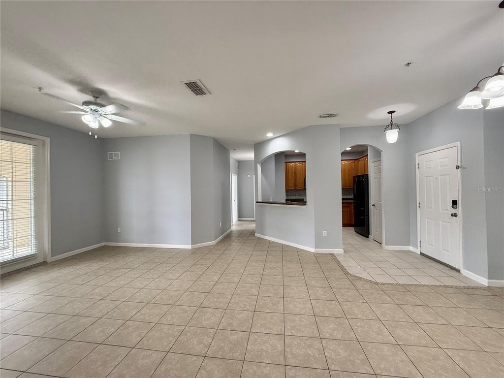 Photo of 3300 Whitestone Circle #304, Kissimmee, FL 34741 (MLS # O6453471)