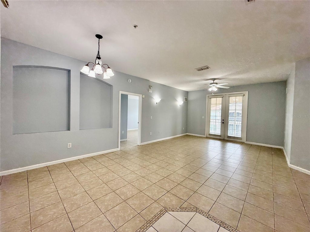 Photo of 3300 Whitestone Circle #304, Kissimmee, FL 34741 (MLS # O6453471)