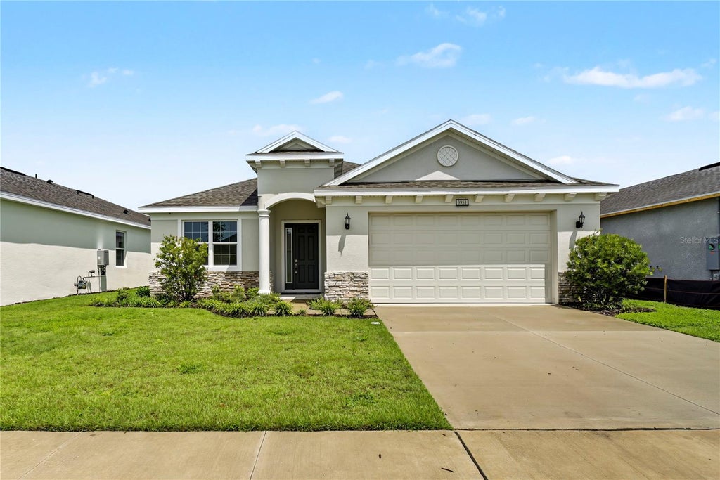 Photo of 3951 Kennebunk Loop, Mount Dora, FL 32757 (MLS # O6439079)