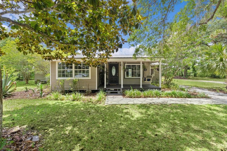 Rare chance to own 2 parcels being sold together (1.38 acre)- One featuring a residential home and the other offering vacant land full of potential.
Step into timeless charm with this adorable 1963 home, beautifully updated while preserving the classic character. Featuring sturdy cedar framing, this home has been thoughtfully renovated inside and out, including durable vinyl siding and stylish luxury vinyl flooring throughout. Enjoy peaceful mornings and relaxing evenings on the inviting front porch complete with a swing, or host family and friends on the spacious back porch designed for gatherings and good times. Weather you're looking for  a cozy retreat or a place to create lasting memories, this charming home is ready to welcome you. ROOF-METAL- 2016   HOT WATER TANK- 2014  AC-2016
