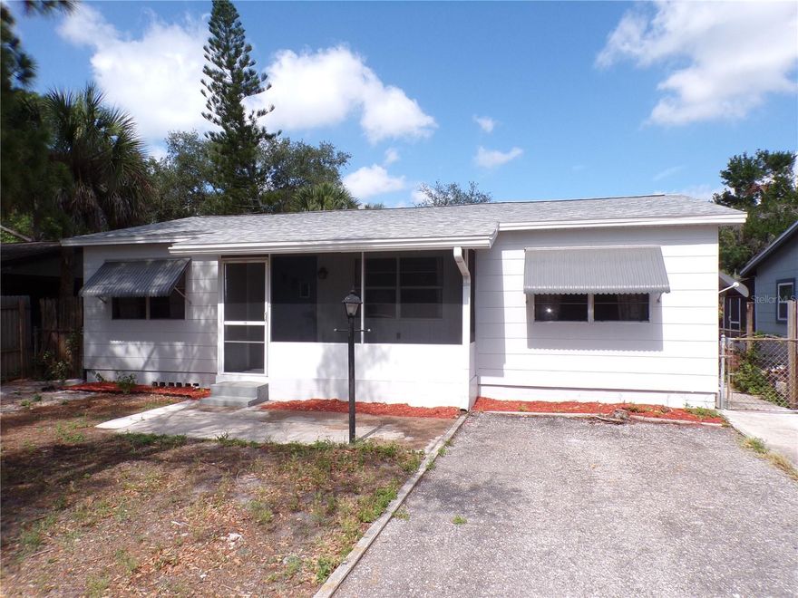 Uber upgrades included with this 4 bedroom, 1 full bath charmer in the Ridge Manor neighborhood of St Pete.  Renting this home out is also being considered.  Home includes brand new roof, brand new AC system, and a brand new kitchen with new real wood cabinets, granite countertops, subway tile backsplash, new stainless steel appliances, and new luxury vinyl plank floors.  The living areas and 2 of the bedrooms boast newly refinished original wood floors, and the other 2 bedrooms have new vinyl floors.  The new bathroom has stylish finishes including oversized subway tile for the bathtub/shower walls, new vanity, bead board wainscot, and new vinyl floors. There is a new water heater, and home was termite tented for precautionary measures. The home sits on a nice spacious lot with a large backyard. The the open layout gives a completely connected flow from the living area into the kitchen and causes the house to feel larger than it actually is. There is a very large garage sized screened in porch in the backyard with hurricane shutters that can be left closed and give locked storage space if desired, or retracted and allows the space to be used as a screened-in outdoor living area.   Come check out the home and you will be pleased!