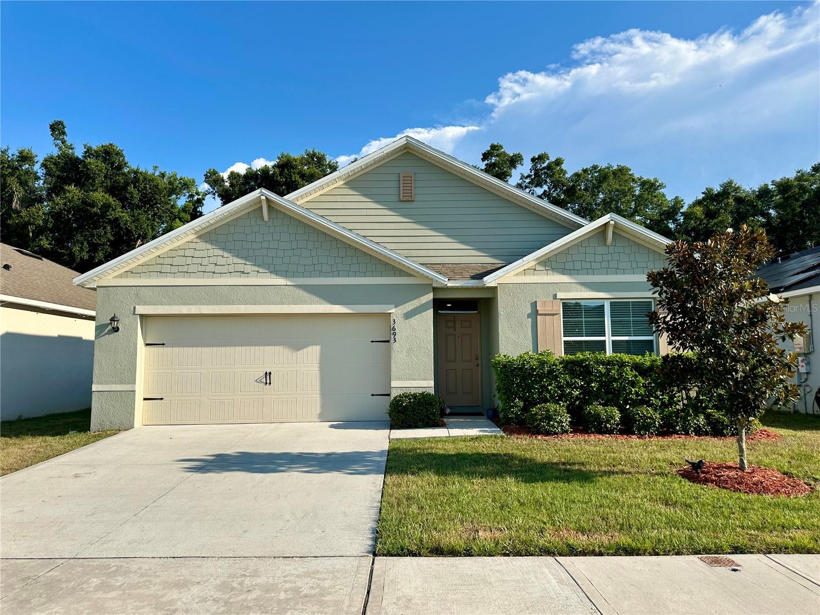 Welcome home to this 4-bedroom, 2-bathroom beautiful home in the desirable Holly Estates! From the moment you walk in you will be invited by the neutral, open concept, modern floorplan that draws you in with all the natural light flowing through the home. You will fall in love with the spacious kitchen overlooking the living room that boasts granite counters, stainless steel appliances, a large pantry, and a big island perfect for cooking and entertaining. The owner’s suite boasts a large walk-in closet, walk-in shower, double vanity, and linen closet. Take advantage of enjoying the outdoors with a screened in porch and large backyard covered patio with pavers perfect for family gatherings and friends. No need to worry about back yard neighbors with a tree lined lot and a FULL VINYL FENCE for complete privacy and backyard fun. Take advantage of all that the Estate amenities have to offer like the crystal-clear pool, parks, soccer field, clubhouse all connected by the community sidewalks. This is what you have been waiting for so schedule your tour today!