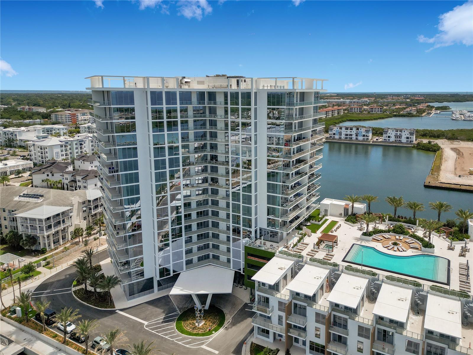 Superbly updated this unit features a Semi-private elevator with panoramic Water and Marina views! Located in Westshore Marina District, the exceptional one-of-a-kind location in Tampa Bay! This home features 3 bedrooms and 2.5 bathrooms with a beautiful patio overlooking the Marina. TWO parking spaces assigned. Contemporary open floor plan, 10' ceiling heights. Floor-to-ceiling glass walls, energy efficient, hurricane-impact resistant windows and multiple-panel sliding glass doors. Custom, motorized window shades with remote controls in every room. Extended kitchen countertop with additional cabinetry and beverage refrigerator as well as pull out shelving in cabinets. Primary bedroom with large soaking tub. Custom shelving in all closets. 24/7 attended lobby with concierge, Internet and Cable and Water, Virtual indoor golf simulator, Fitness Center, Social Lounge, resort-style pool deck, Secluded heated SPA, day beds, Covered pavilion and gas grills. Private boat slips in beautiful deep-water marina. Located in heart of Tampa Bay, direct access to downtown Tampa and downtown St. Petersburg. Schedule a showing NOW!