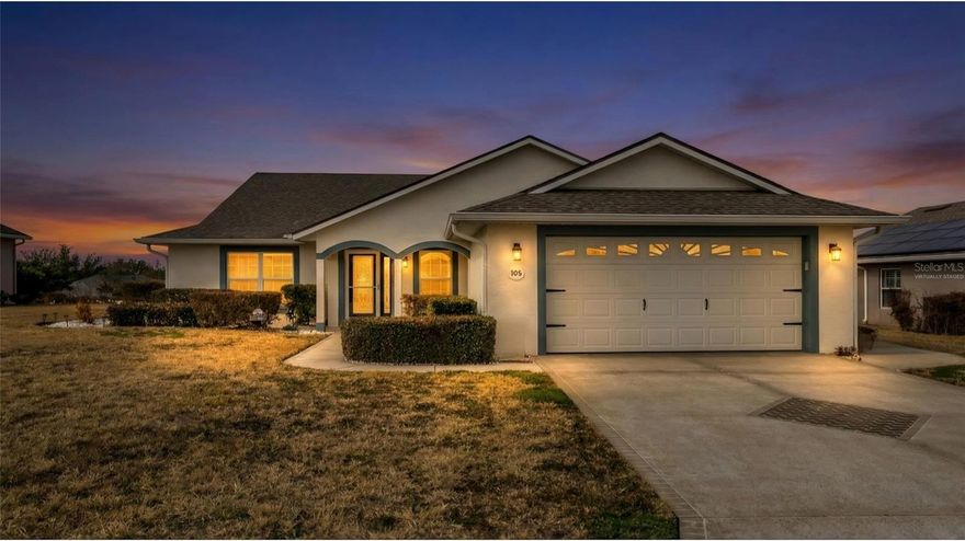 One or more photo(s) has been virtually staged. Introducing “The Saint” at 106 Fairway Circle, Umatilla, Florida!

This exceptional home features a unique split floor plan, boasting dual primary bedrooms, each with its own en-suite bathroom and walk-in closets. Enjoy breathtaking views as the home overlooks a gently rolling hill leading down to a serene pond.

With no carpeting and beautiful plantation shutters throughout, this home is move-in ready. Recent updates include a newer roof (June 2024), HVAC (2023), interior paint (2024), and vinyl flooring in all bedrooms (2024). The septic tank cover, sprinkler system, and all ceiling fans were updated in 2024. The home also features new French doors and windows for the enclosed lanai (2024), updated electrical systems (2024), and a new hot water heater (2024). Additionally, there are solar-powered coach lights and porch lights that illuminate the deck.

Located in a vibrant 55+ community, “The Saint” offers a welcoming environment perfect for snowbirds and those seeking a relaxed lifestyle.

Don’t miss the chance to experience this immaculate home!