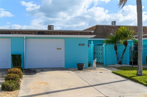 Photo of 350 Boca Ciega Point Blvd, St Petersburg, FL 33708 (MLS # TB8465112)