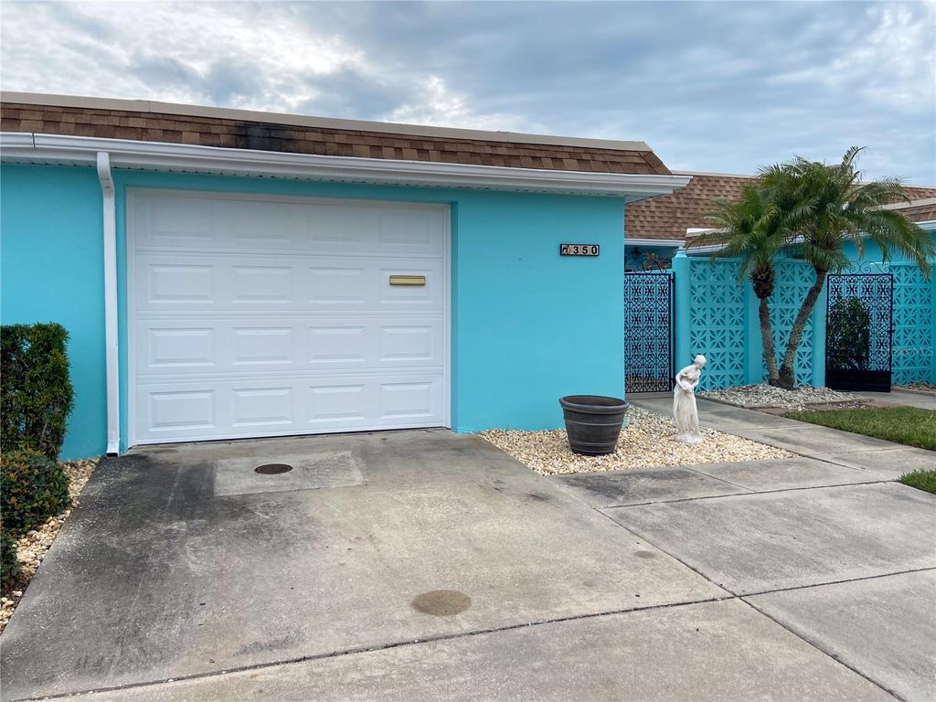 Photo of 350 Boca Ciega Point Blvd, St Petersburg, FL 33708 (MLS # TB8465112)