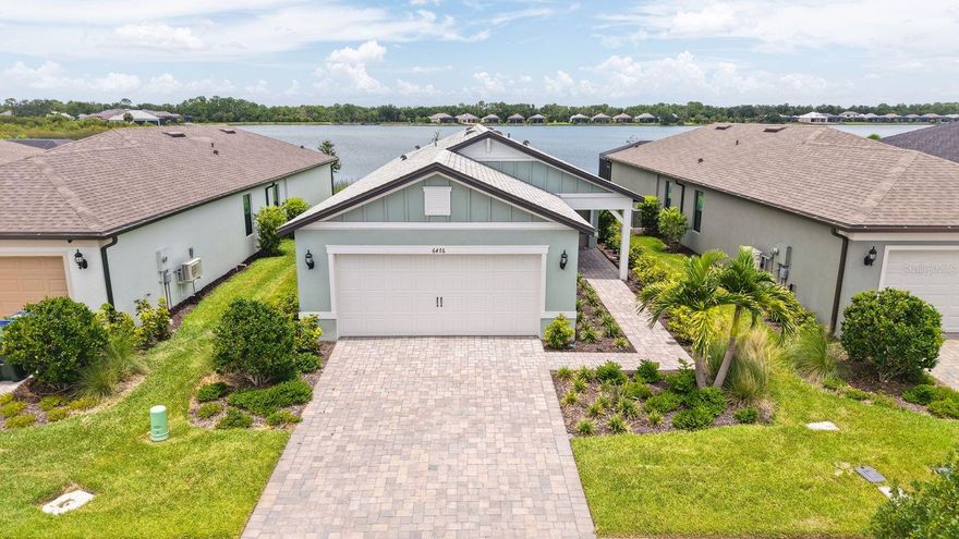 BEAUTIFUL NEW CONSTRUCTION 4 Bedroom 2 Bathroom Turnkey Furnished Single Family Home with Fabulous Lake Views situated in AVANTI AT WATERSIDE!  How wonderful it will be for you to reside in this spacious open concept floor plan that is full of sunshine over- looking an extensive peaceful lake right in your backyard!  Enjoy all New Furnishings and Appliances in this Fantastic setting that is perfect for entertaining and every day living!  Located just minutes from Waterside Place with dining venues, shopping, weekend farmers markets and community events. Only a short drive to Siesta Key Beach, Lido Beach, Downtown Sarasota, and UTC Mall with extensive shopping and dining!  Enjoy Brand New Construction in this  spacious open floor plan, fabulous lake views in sought-after location in Lakewood Ranch.  Why Wait - Contact us to schedule a private viewing!   Come and enjoy this Beautiful home in the Sunshine State!