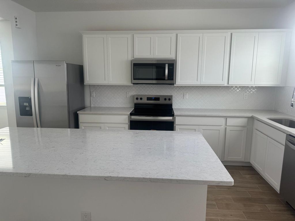 Photo of 4564 Orchard View Alley, Clermont, FL 34714 (MLS # O6424880)