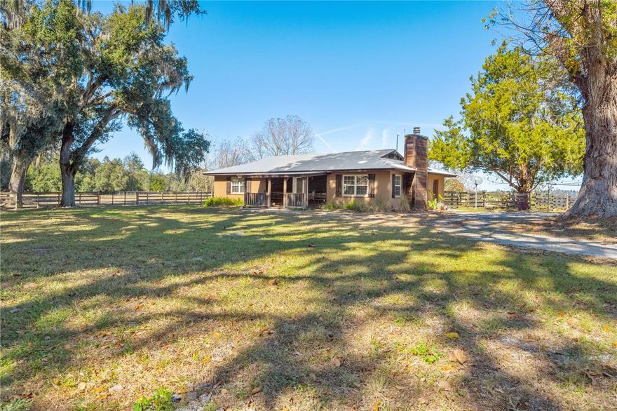 This beautifully laid-out equestrian property offers a rare combination of functionality, comfort, and an outstanding location in a peaceful countryside setting. Situated on just over 10 acres, the farm is thoughtfully designed for efficiency and ease of use—ideal for serious horse enthusiasts or professionals. Offering scenic views of the surrounding land, mature trees, open fields, ponds, and consistant surrounding properties.

The property features a riding arena, a covered riding area, a 7-stall barn, and a hot walker, providing excellent infrastructure for training and daily care. A separate pole barn adds valuable additional storage or utility space.

A barn apartment and a separate cottage, both currently leased and income-producing, offer immediate revenue potential and flexibility for staff housing, guests, or future owner use.

The updated main home is warm and inviting, featuring a wood-burning fireplace, open floor plan and modern improvements throughout. A huge workshop with lean-tos provides ample space for equipment storage and could easily be converted into additional stalls, allowing for easy expansion of the equestrian operation.

The entire property is gated for privacy and security, and its prime location makes it a truly standout opportunity for a turnkey equestrian facility with built-in income.  

Conveniently located within easy distance to World Equestrian Center, HITS, Black Prong Equestrian Village, Goethe State Forest, as well as multiple trailheads.  Remote to Ocala, Gainesville, Chiefland, Dunnellon and Crystal River as well as the entire Nature Coast.  Come check it out and find your place in the Sun!