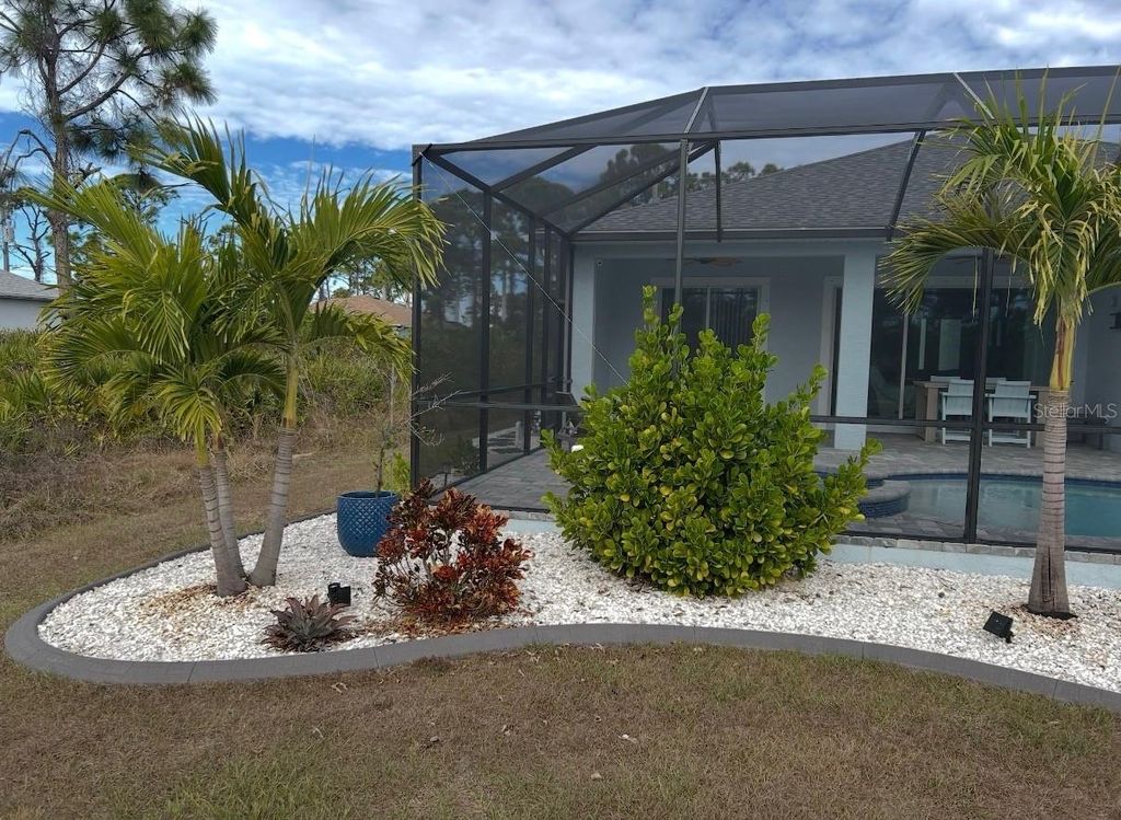 Photo of 109 Flower Road, Rotonda West, FL 33947 (MLS # C7528098)