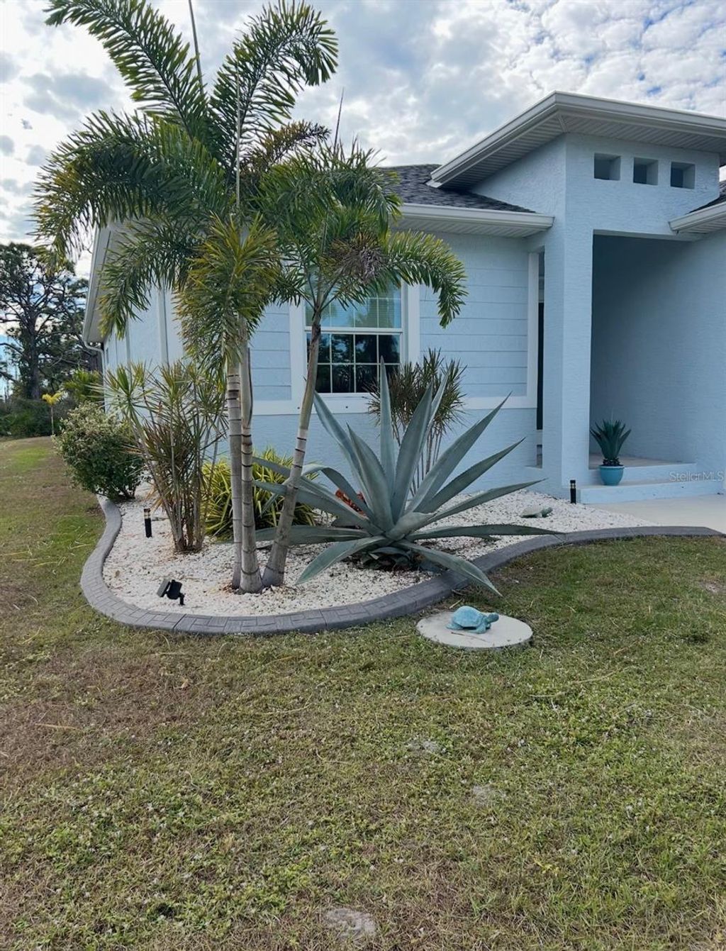Photo of 109 Flower Road, Rotonda West, FL 33947 (MLS # C7528098)