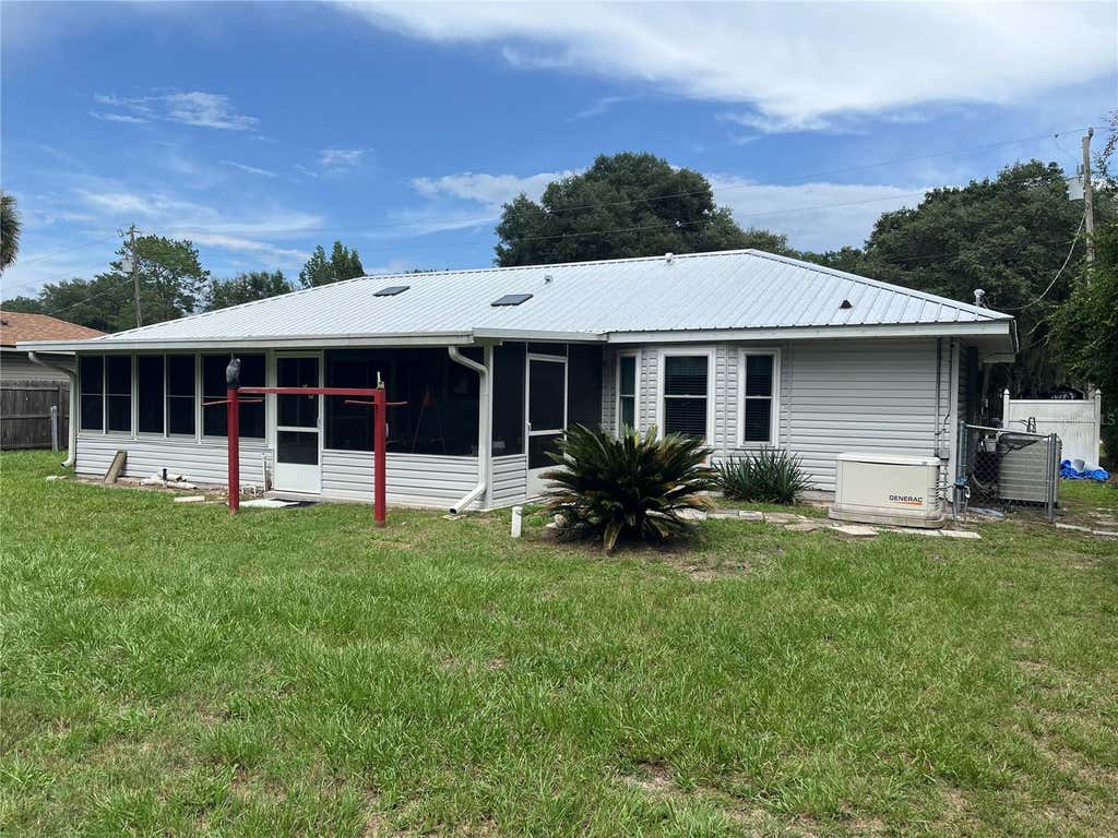 Photo of 2392 SE 175th Terrace Road, Silver Springs, FL 34488 (MLS # OM728789)