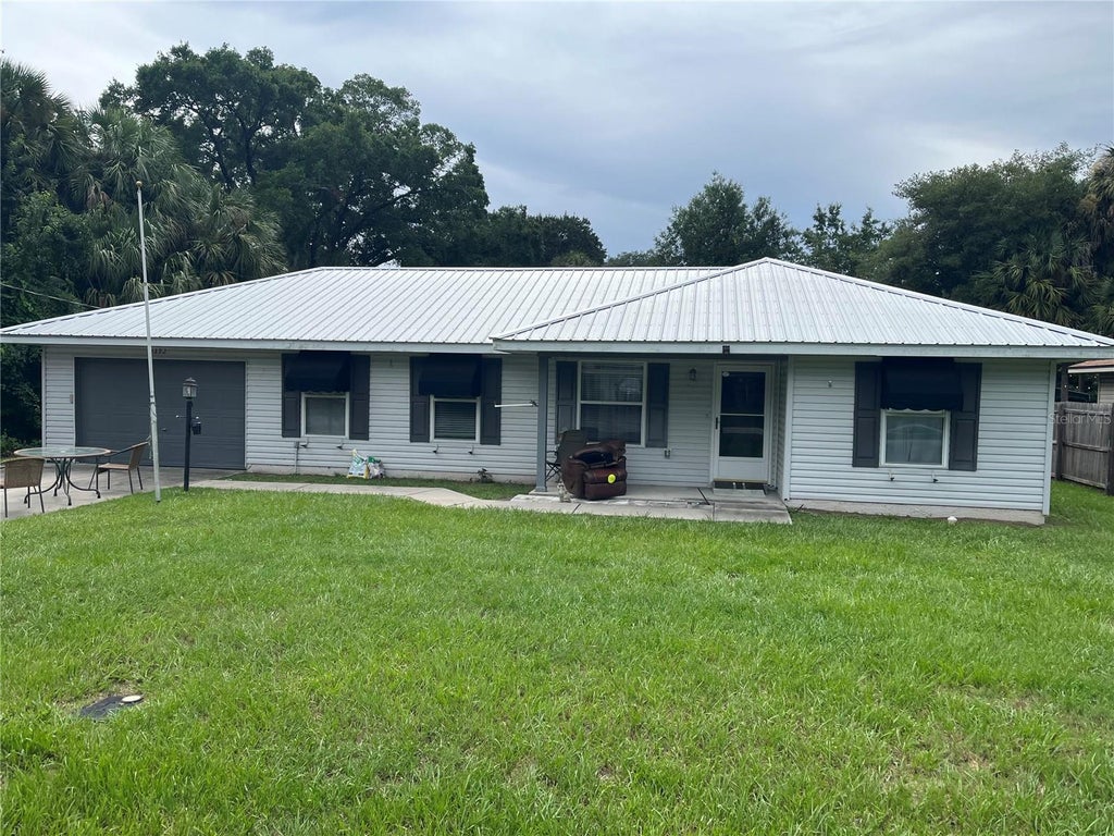 Photo of 2392 SE 175th Terrace Road, Silver Springs, FL 34488 (MLS # OM728789)
