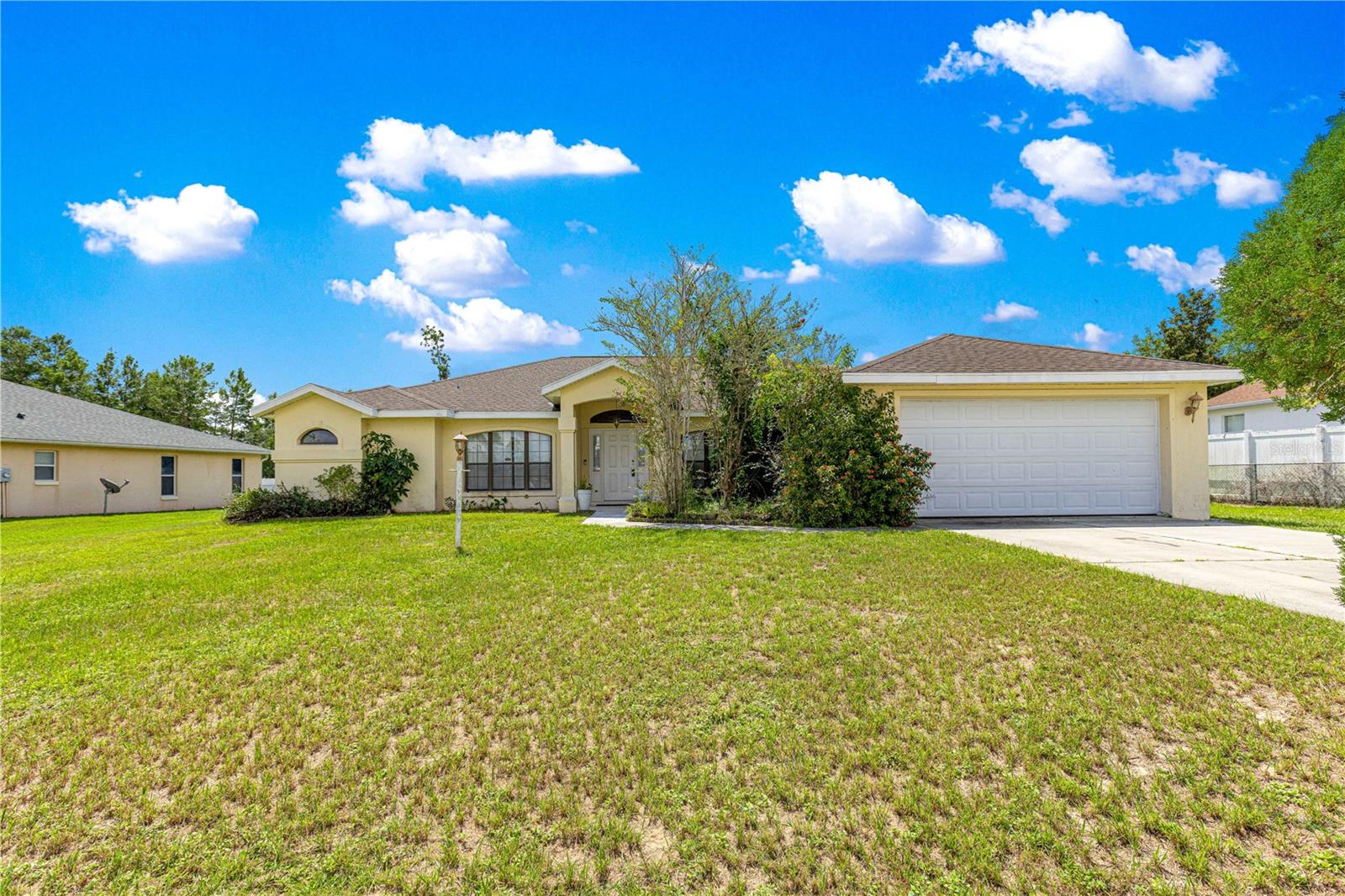 Beautiful 3 bedroom, 2 bathroom home with a versatile den/office located in the desirable Ocala Waterway subdivision. This spacious home features tile and wood flooring throughout, with wood floors in all bedrooms. The formal dining room is perfect for entertaining, while the kitchen offers tile flooring, plenty of counter space, and all appliances included. The master suite boasts two private walk-in closets, a walk-in shower, soaking tub, and dual sinks. Home also offers a laundry room with washer and dryer included. Additional highlights include a 2-car garage with opener and side door access, an exterior shed for extra storage, and a vinyl-fenced backyard for privacy. SELLER WILL REPLACE ROOF WITH AN ACCEPTABLE OFFER.