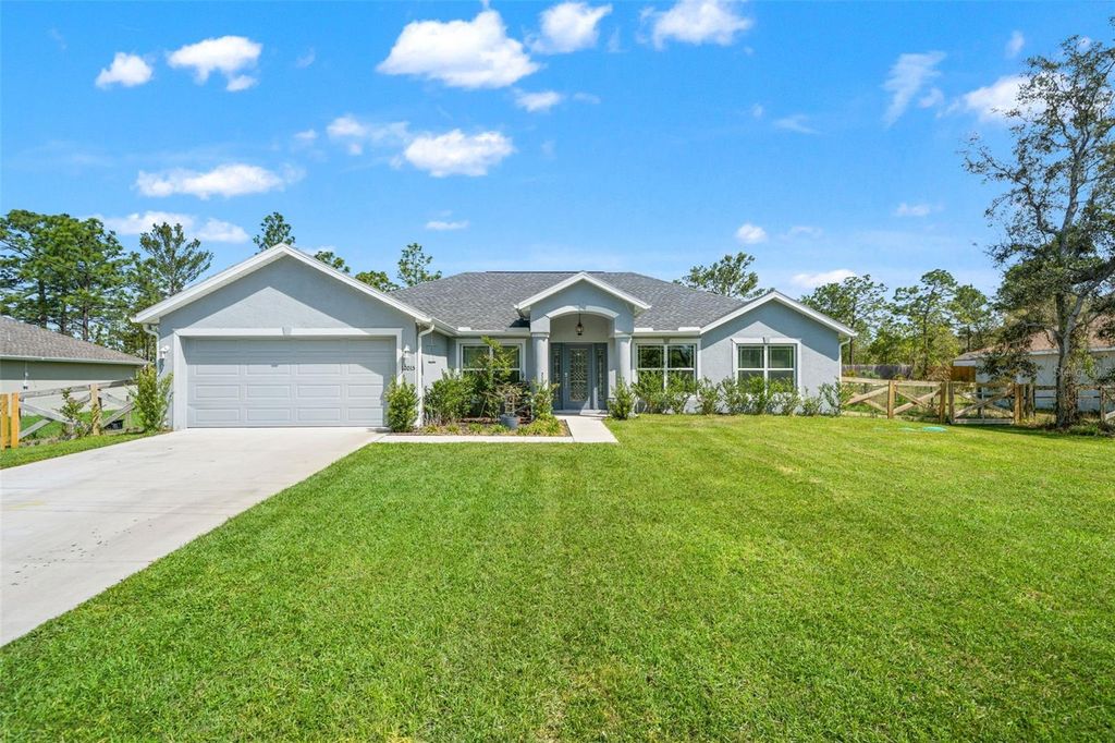 Photo of 12015 Phoenix Avenue, Weeki Wachee, FL 34614 (MLS # TB8495141)