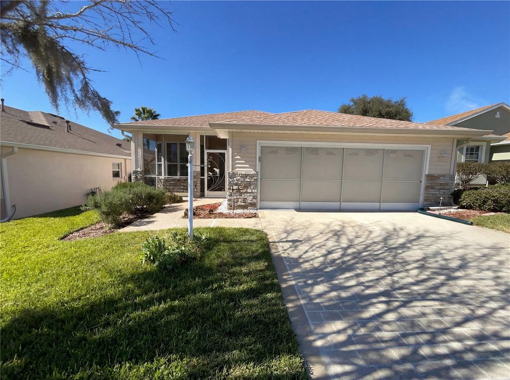 Photo of 5928 Brittania Boulevard, Tavares, FL 32778 (MLS # O6380261)