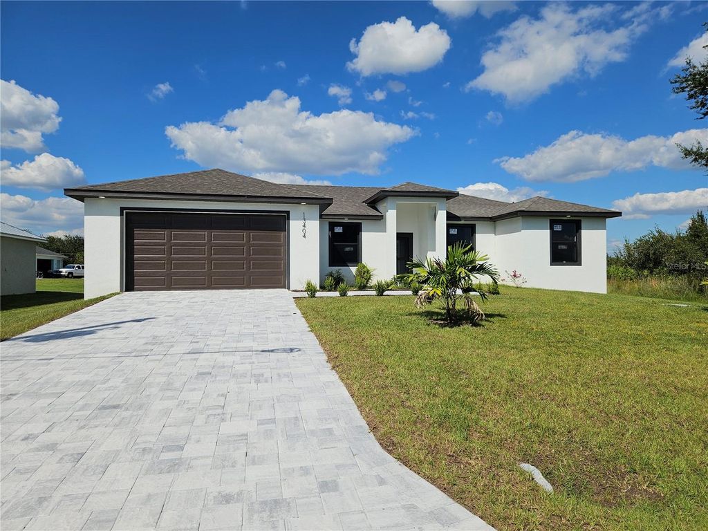 Photo of 13404 Cedar City Avenue, Port Charlotte, FL 33981 (MLS # O6340893)