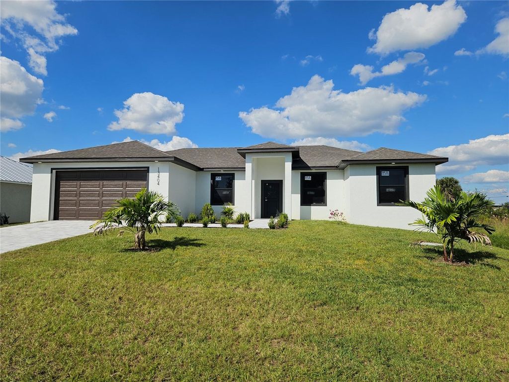 Photo of 13404 Cedar City Avenue, Port Charlotte, FL 33981 (MLS # O6340893)