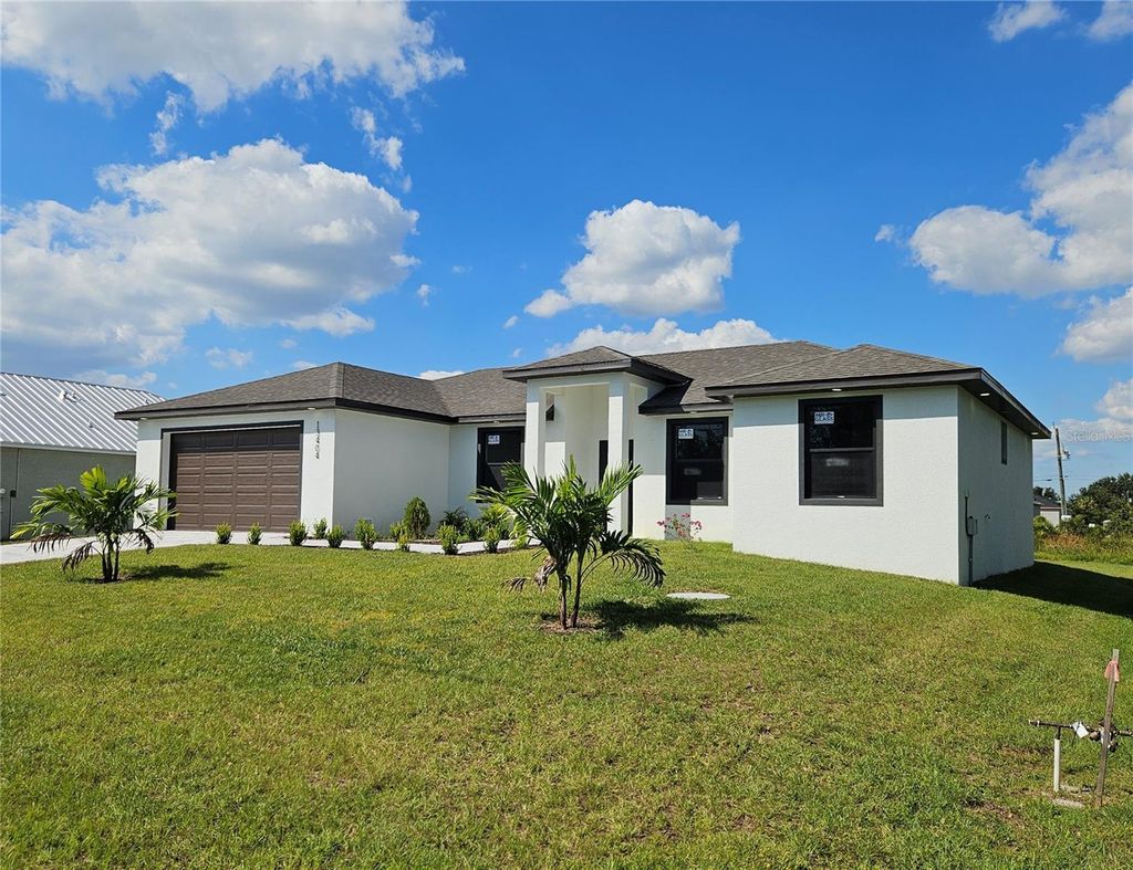 Photo of 13404 Cedar City Avenue, Port Charlotte, FL 33981 (MLS # O6340893)