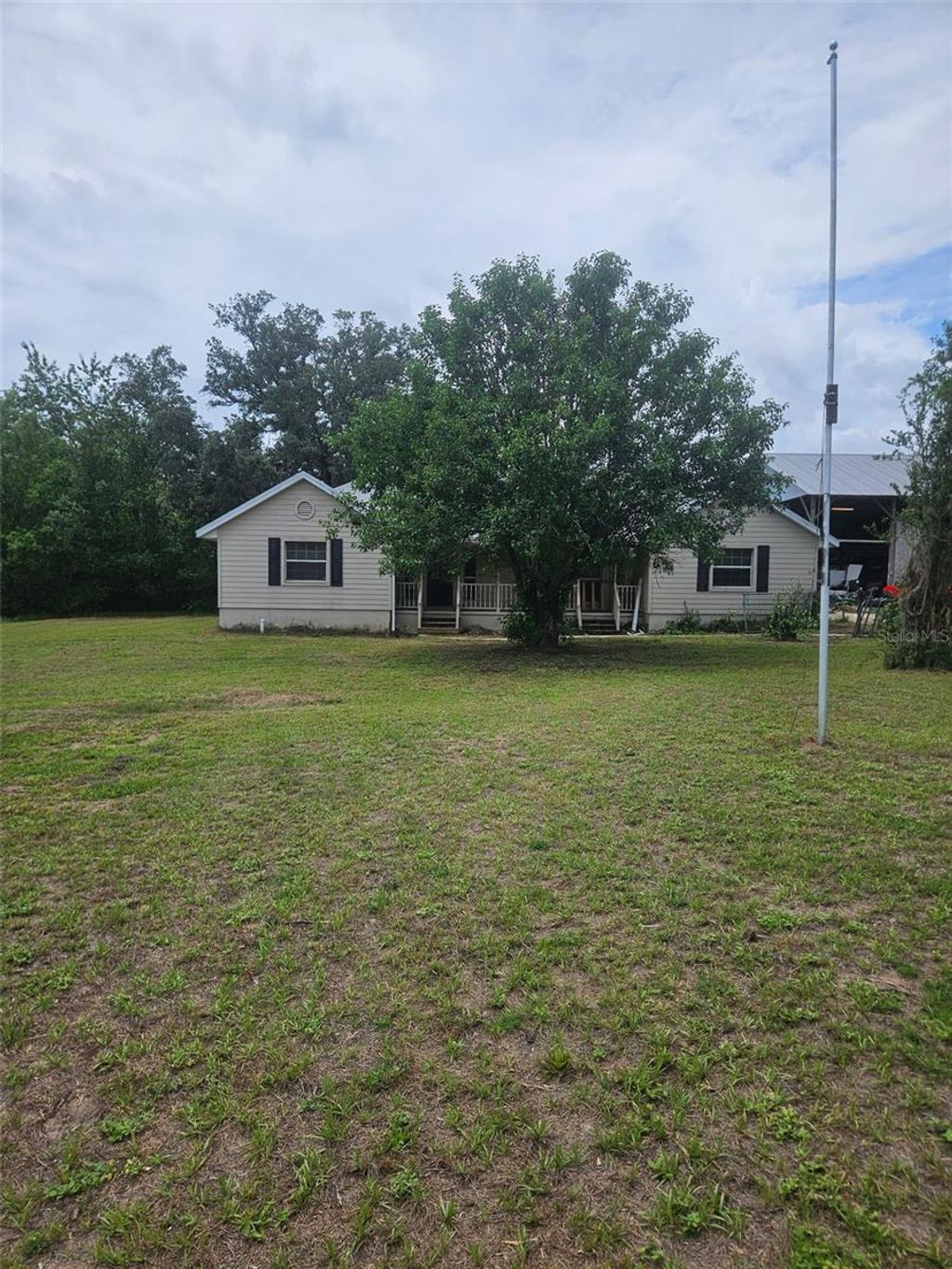 Photo of 18890 SW 44th Street, Dunnellon, FL 34432 (MLS # OM725952)