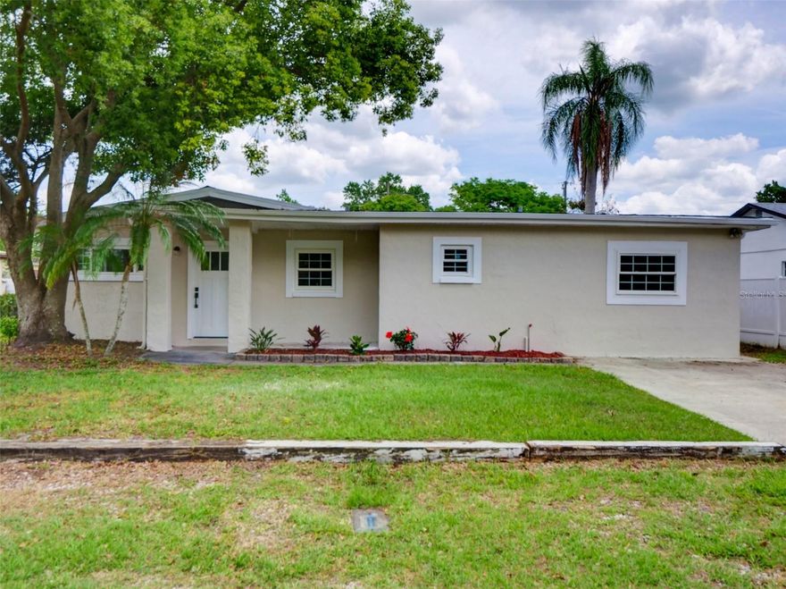 This home has options. A multiple bedroom mother-in-law suite, extended family needs, space for UCF students, it has possibilities!
Nicely remodeled and upgraded. New central heat and air with new additional mini split A/Cs. New vinyl laminate flooring throughout. The kitchen and baths show well with the kitchen's stainless appliances and finishes. Up graded double pane windows, completely re-textured and painted interior, with all new doors, hardware and base board trim throughout the home. The exterior has been completely repainted. For outdoor enjoyment and fun, there is a large 28x23 covered outdoor patio and summer kitchen, a unique outstanding feature. For UCF students, this is uniquely located where you can ride a bike or e scooter from the neighborhood to the adjacent UCF campus.