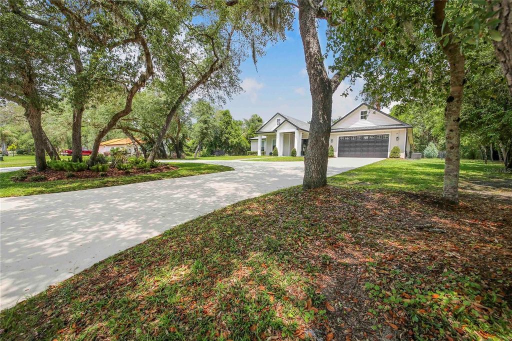 Photo of 1 Pine Forest Drive, Haines City, FL 33844 (MLS # P4938615)