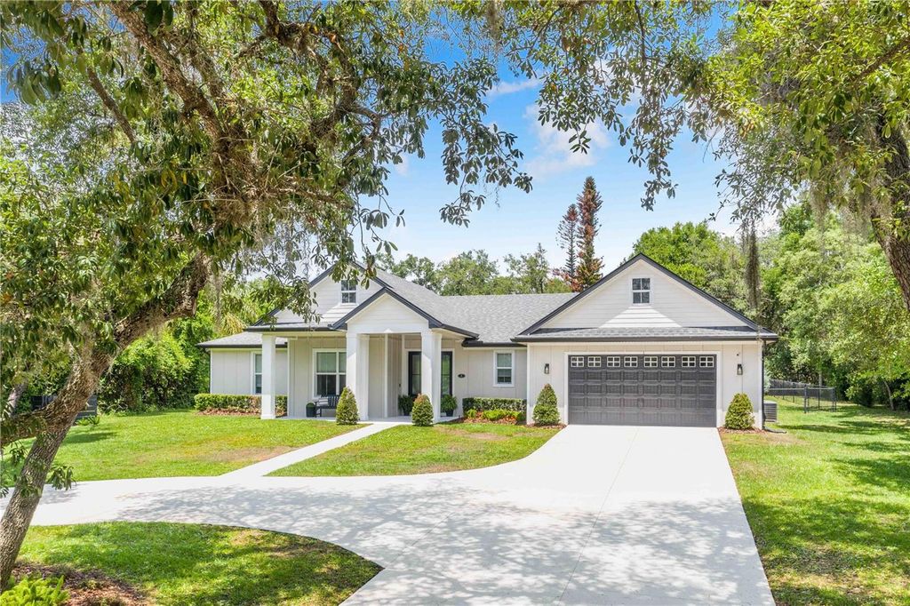 Photo of 1 Pine Forest Drive, Haines City, FL 33844 (MLS # P4938615)