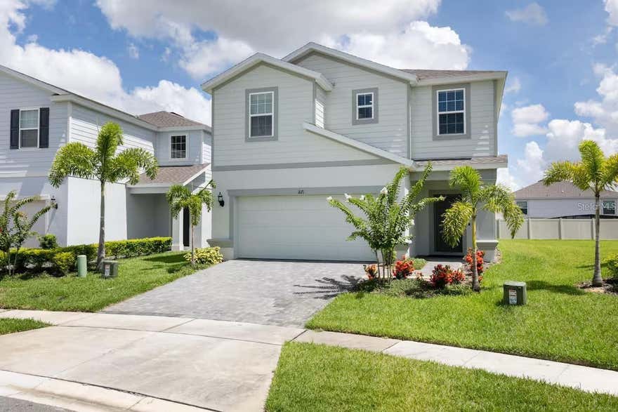 Stunning two-story home, fully furnished and thoughtfully designed to offer comfort, sophistication, and excellent investment potential. A charming front porch and landscaped entry create a warm and elegant first impression.

Perfect for short-term rentals, this property is located in a high-demand vacation rental area, making it an excellent opportunity for investors or those seeking a vacation home.

The home features 7 spacious bedrooms, 5 full bathrooms, and 1 half bath, providing plenty of space to accommodate family and guests comfortably. The kitchen is fully equipped with all essential appliances and is move-in ready.

Sliding glass doors seamlessly connect the indoor and outdoor living spaces, leading to a private screened pool, covered lanai, and an ideal area for entertaining and barbecues. To enhance the resort-style experience, the home also includes a heated spa, perfect for relaxing year-round.

The laundry room is fully equipped and ready for use. The spacious living and dining areas create a comfortable and inviting atmosphere, perfect for gathering and entertaining.

Located in the exclusive Windsor Island Resort, residents and guests enjoy access to outstanding amenities, including a resort-style pool, clubhouse, game room, beach volleyball court, water park, lazy river, fitness center, and more.

Conveniently located near major attractions such as Walt Disney World Resort, Universal Orlando Resort, ChampionsGate, shopping, restaurants, supermarkets, and with easy access to US-27 and I-4, making travel throughout Central Florida simple and convenient.

This is an incredible opportunity for anyone looking for a luxury vacation home or an income-producing investment property in a prime location. Contact us today to schedule a private showing.