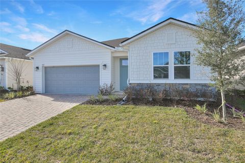 Photo of 202 Enclave Avenue, Palm Coast, FL 32164 (MLS # S5139832)