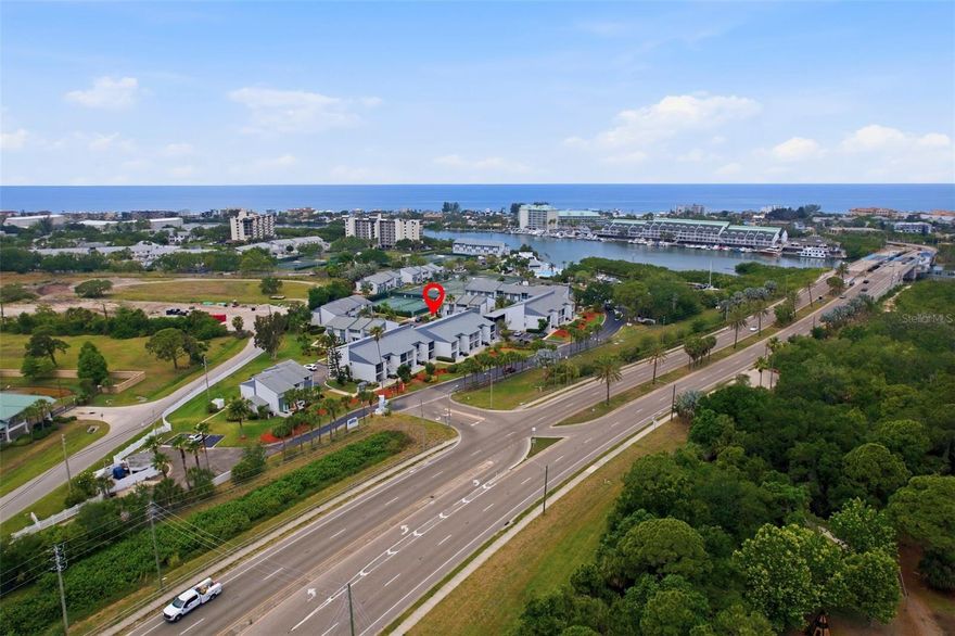 Welcome to Indian Springs — one of Largo’s most sought-after coastal communities, perfectly positioned just over the bridge from the white sands and sparkling Gulf waters of Indian Rocks Beach. Whether you’re searching for a full-time residence, seasonal escape, or income-producing investment, this charming ground-floor condo checks all the boxes (and maybe your margarita cravings too — because Crabby Bill’s, PJ’s, and Jake’s Cantina are all less than a 5-minute walk away).
Indian Springs is known for its beautifully maintained grounds, mature tropical landscaping, and resort-style amenities. Residents enjoy access to an intracoastal-front heated pool, tennis and pickleball courts, and miles of walking trails throughout the neighborhood — no gym membership required when sunset strolls are this good. Grocery stores, shopping, downtown St. Petersburg, and Tampa International Airport are all conveniently nearby, making this an ideal location for both owners and vacation renters alike.
This desirable unit includes a detached one-car garage — perfect for parking, beach gear, bikes, paddleboards, or all the things you swore you wouldn’t bring to Florida but somehow did. The ground-floor entry opens to an oversized private porch with room for lounging, gardening, and enjoying warm Gulf breezes and colorful sunset skies. An additional storage closet on the porch provides even more convenience.
Inside, the split-level floorplan offers comfortable separation between living and sleeping spaces. The main level features a spacious living room with ceramic tile throughout and an open flow into the dining area and kitchen, complete with stainless steel appliances and plenty of natural light. Upstairs, both bedrooms overlook the lush landscaping and sunny courtyard grounds. The guest bedroom offers generous closet space and easy access to the guest bath with a tub/shower combination. The primary suite features a walk-in closet with an in-unit stackable washer and dryer, plus an ensuite bath with ceramic tile and another tub/shower combo.
Beyond the incredible lifestyle and location, this property also offers outstanding income potential, with similar units renting for approximately $4,500–$5,000 per month during peak season from January through April. With a one-month minimum rental period and the ability for owners to have two small dogs, this is the perfect blend of flexibility, investment opportunity, and everyday coastal living.
Whether you’re looking for a sunny beach retreat, a smart investment, or simply a place where flip-flops become part of the dress code, this Indian Springs condo delivers. Opportunities in this community do not come along often — schedule your private showing today and come experience the easygoing coastal lifestyle for yourself.